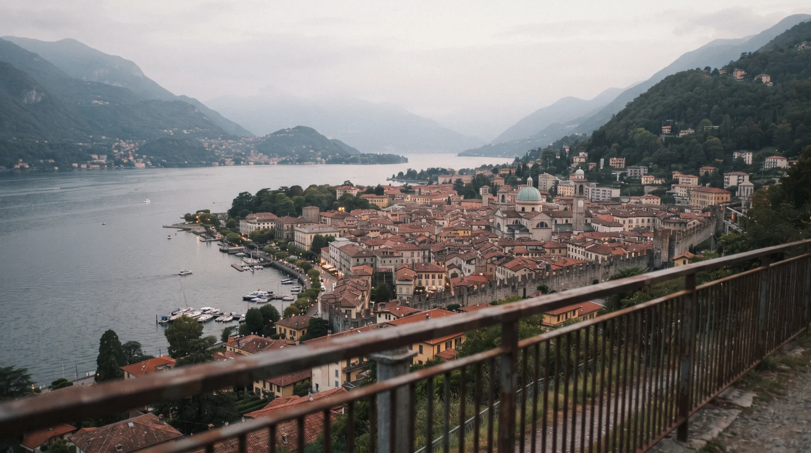View over the walled town and lakefront from Brunate, the ground covered by this Como, Italy map